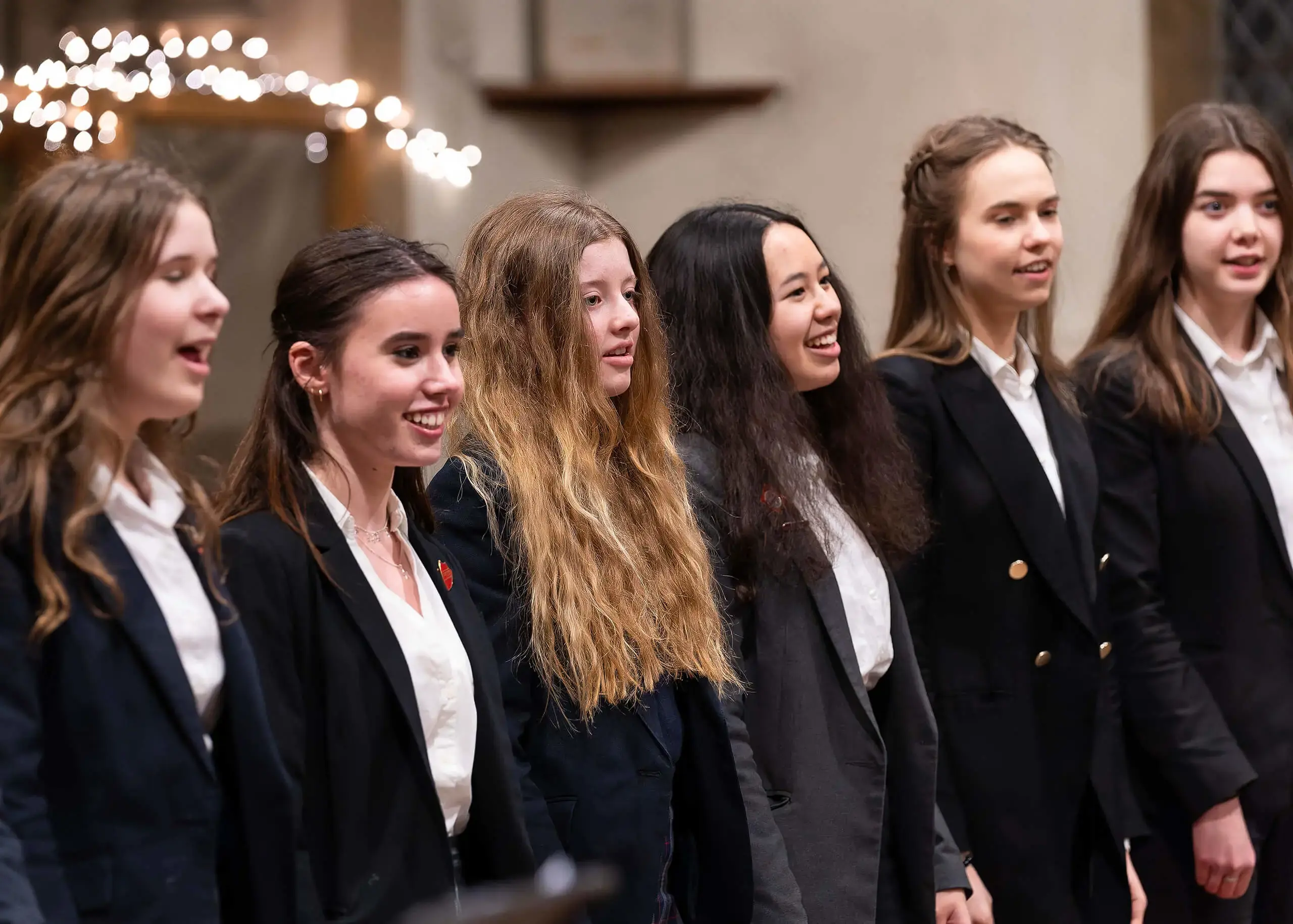 Ryde School Sixth Form pupils singing in church