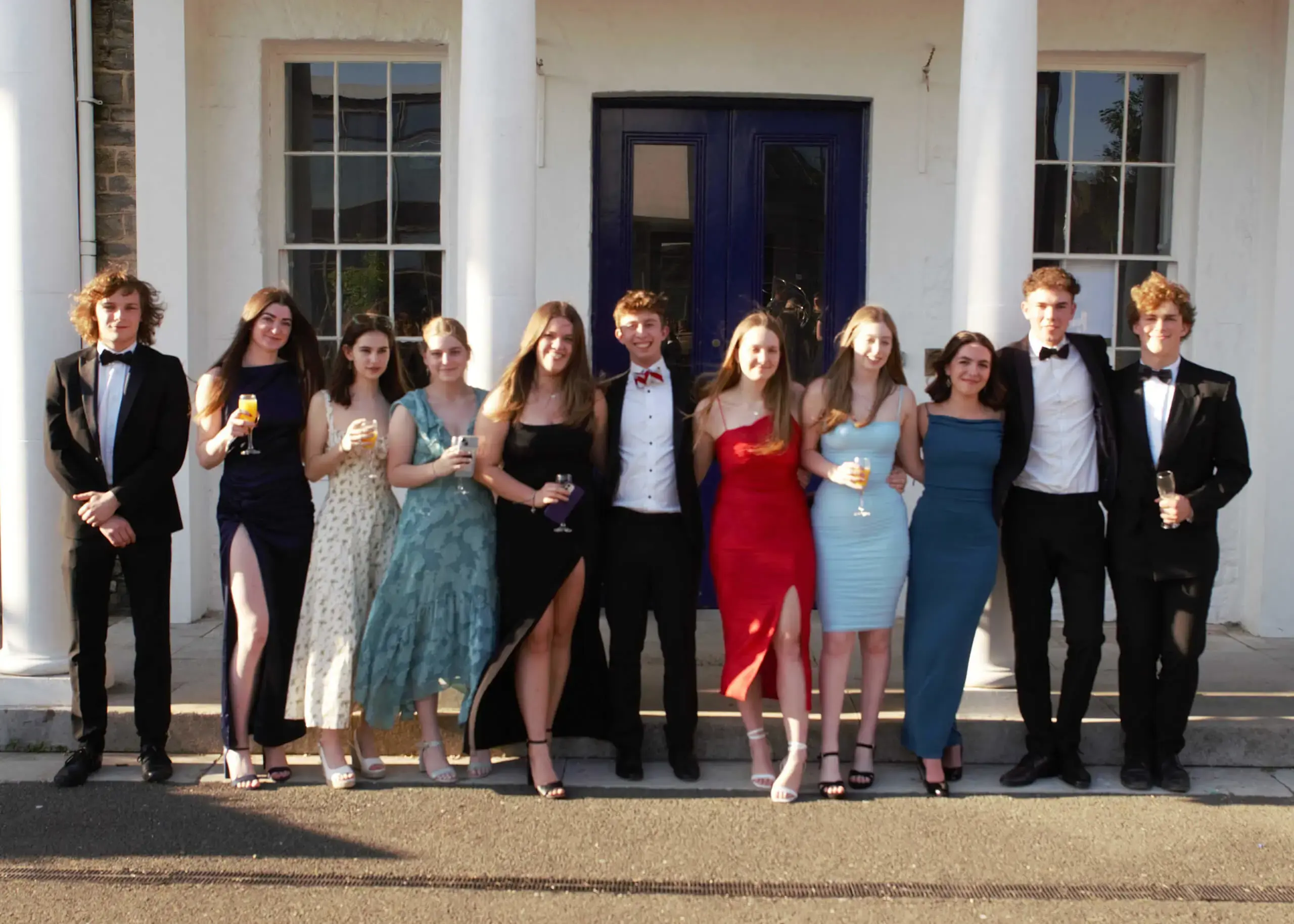 Ryde School Sixth Form pupils in formal attire outside